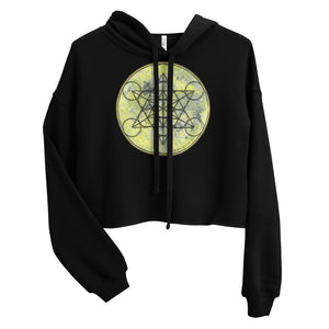 a cropped black crop top hoodie with a geometric design on the front.