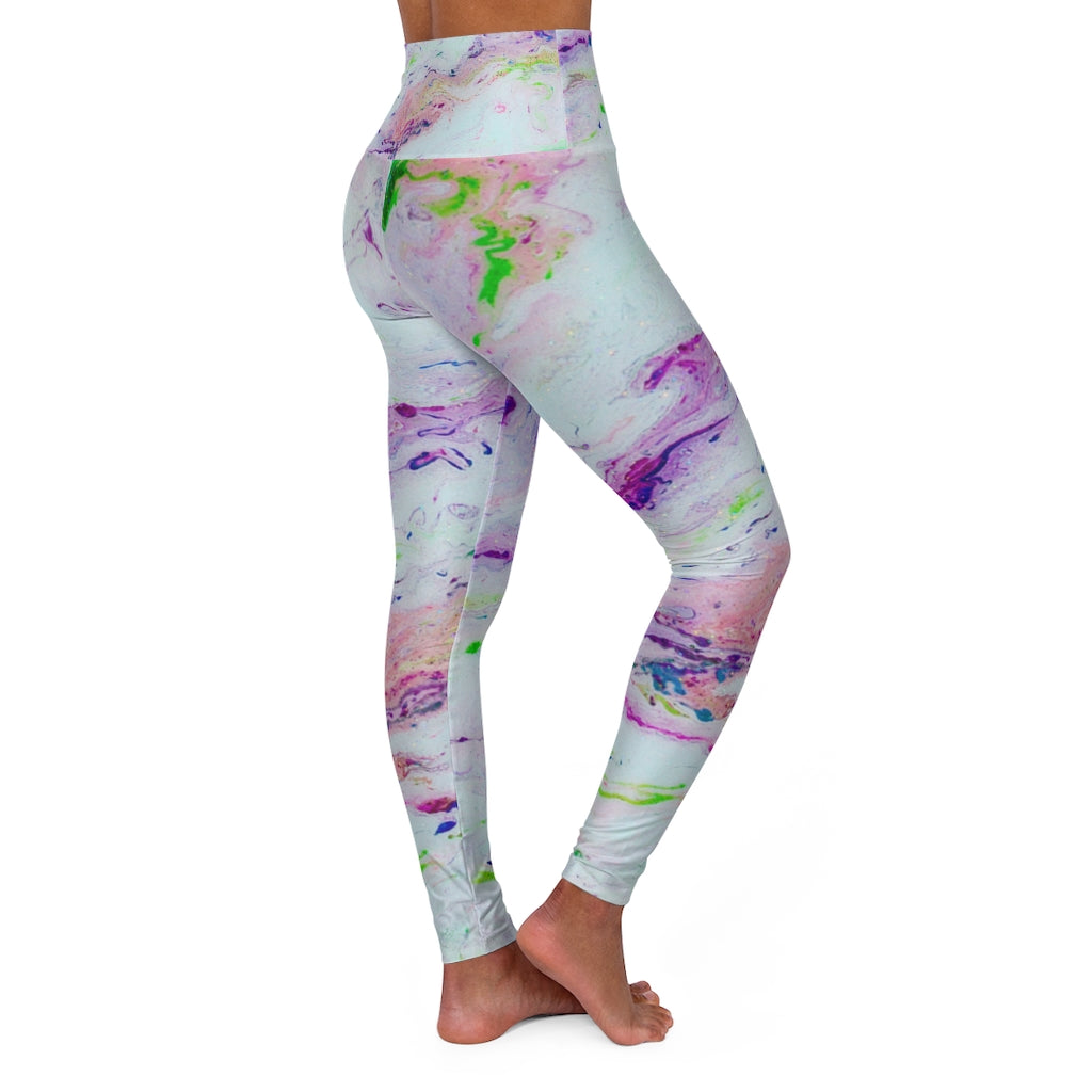a women's yoga pants with a colorful pattern.	