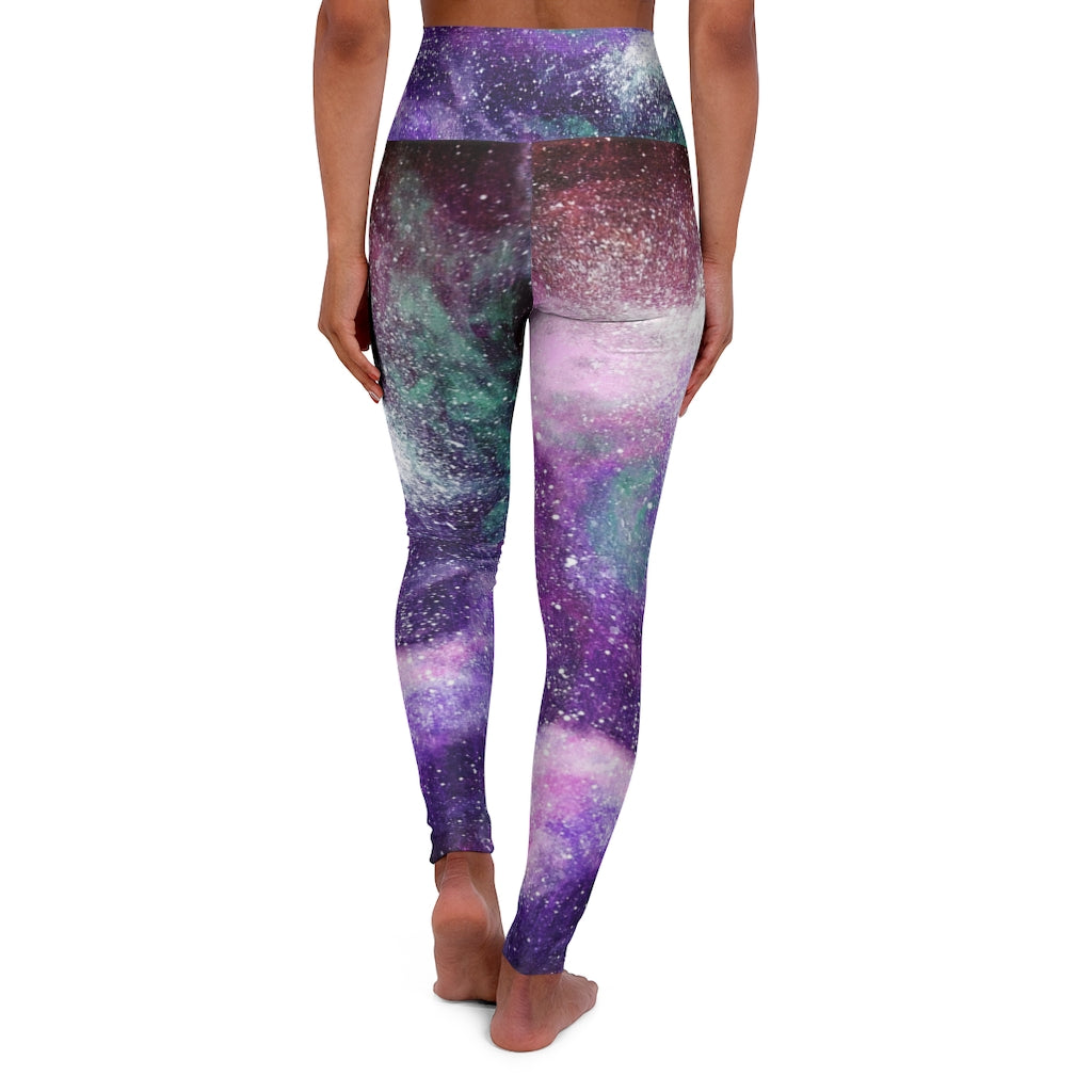 a women's leggings with a purple and green galaxy print.	