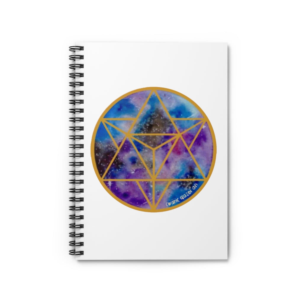 a spiral notebook with a geometric design in the center.	