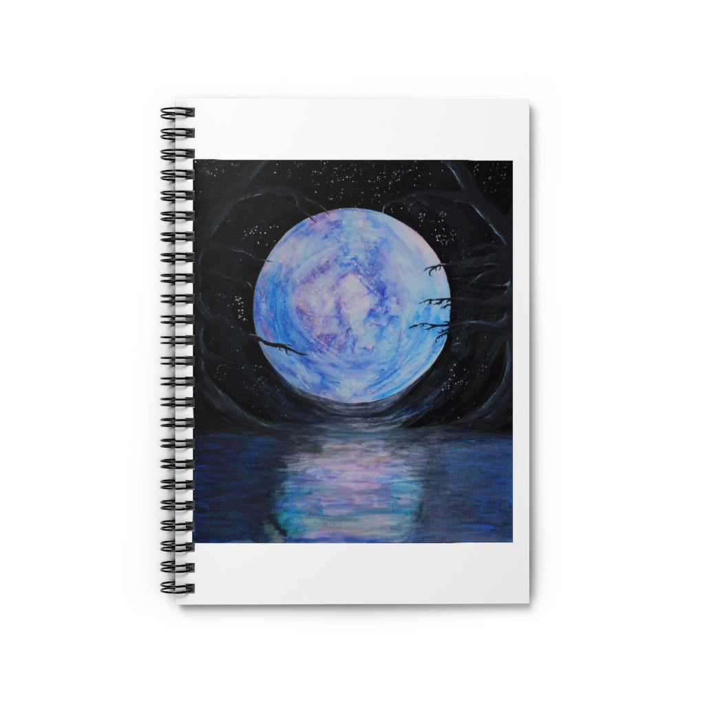 a spiral notebook with a painting of a full moon.	