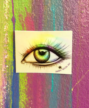 a drawing of an eye on a sticker.	