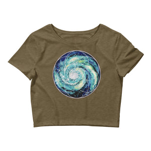 a military green crop top with a spiral galaxy seed of life design on it.	