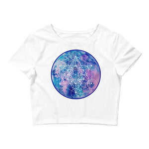 a white crop top with a blue and purple geometric design.	