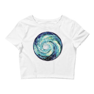 a white crop top with a spiral galaxy seed of life image on it.	