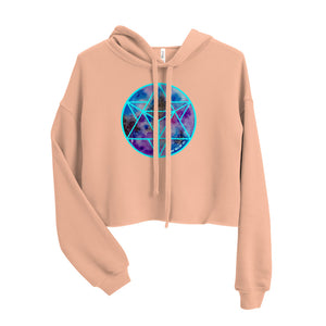 a cropped peach crop top hoodie with a sacred geometry design on the front.