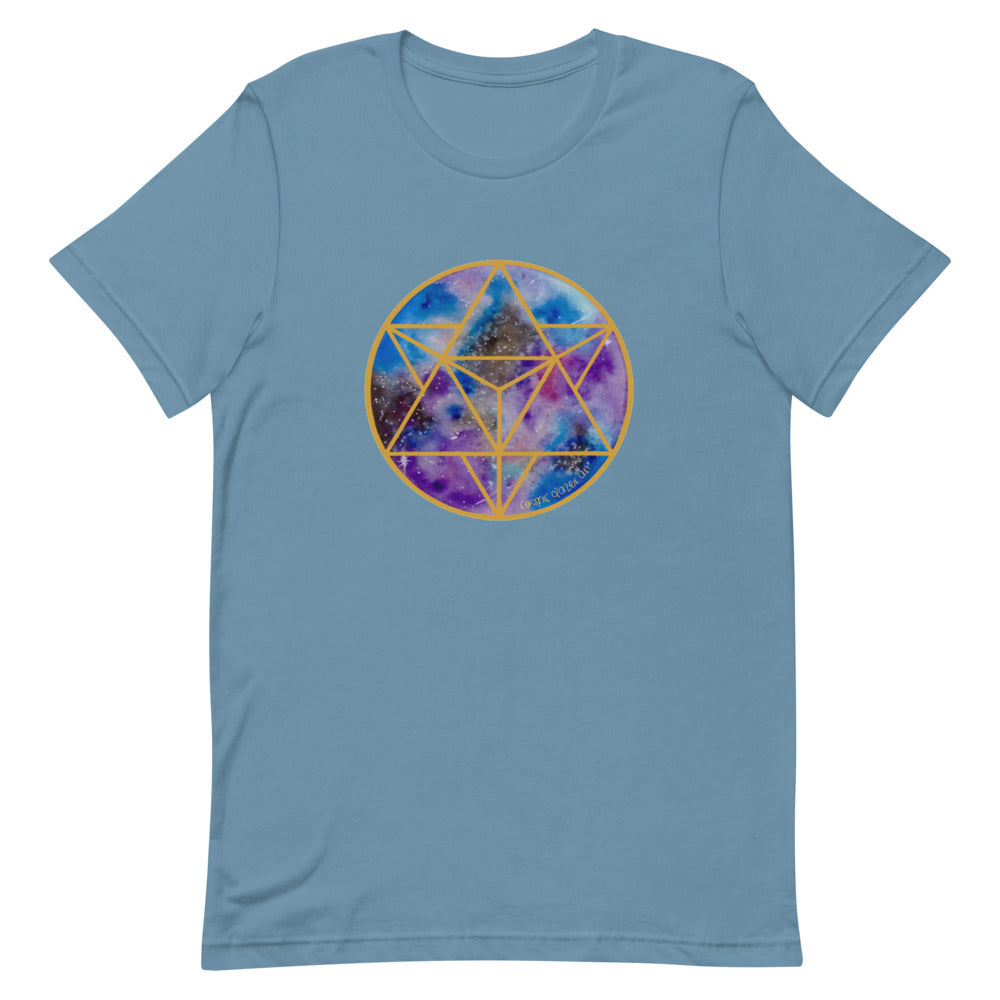 a steel blue t - shirt with a gold and blue and purple geometric design.	