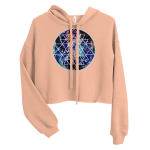 a cropped peach crop top hoodie with a sacred geometry design on the front.