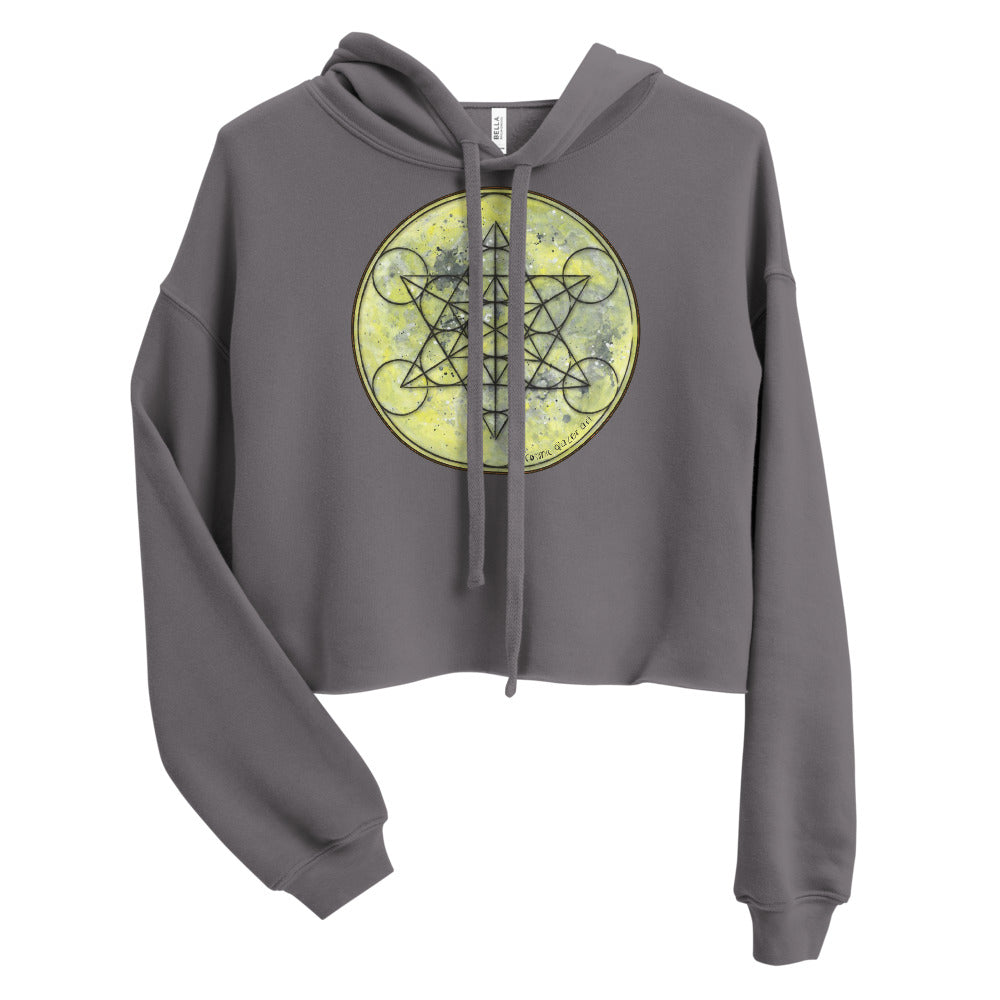 a cropped grey crop top hoodie with a geometric design on the front.